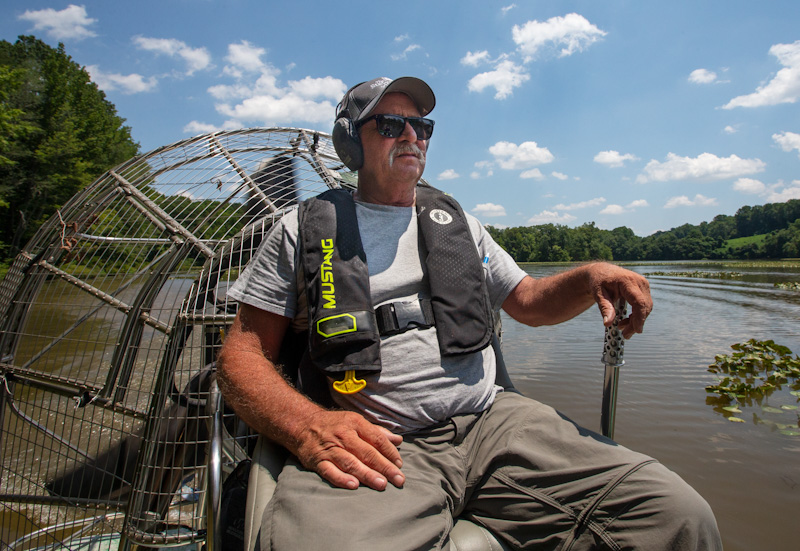 David Jackson of the Water Resources Department Drives an Airboat