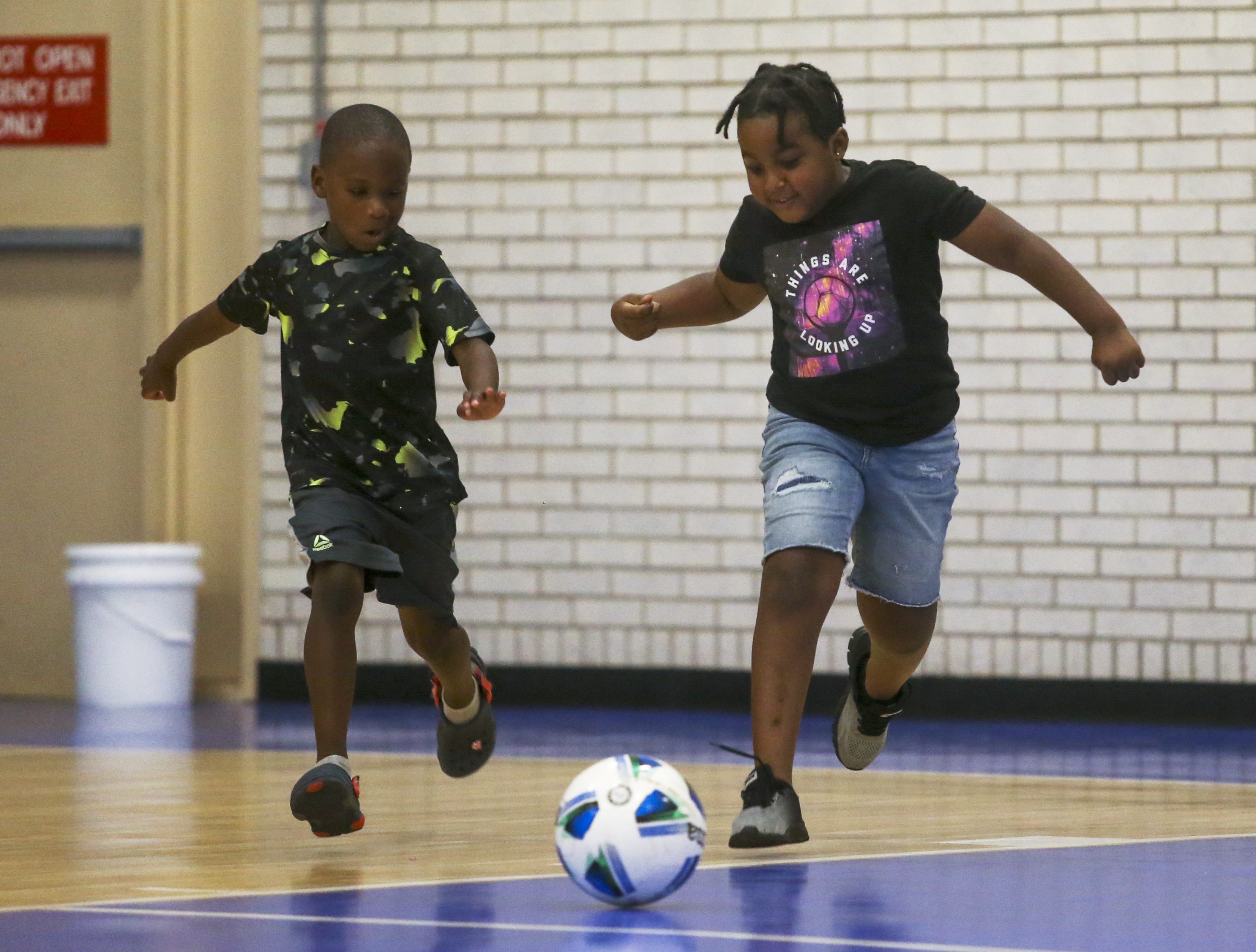 Children playing with soccer ball