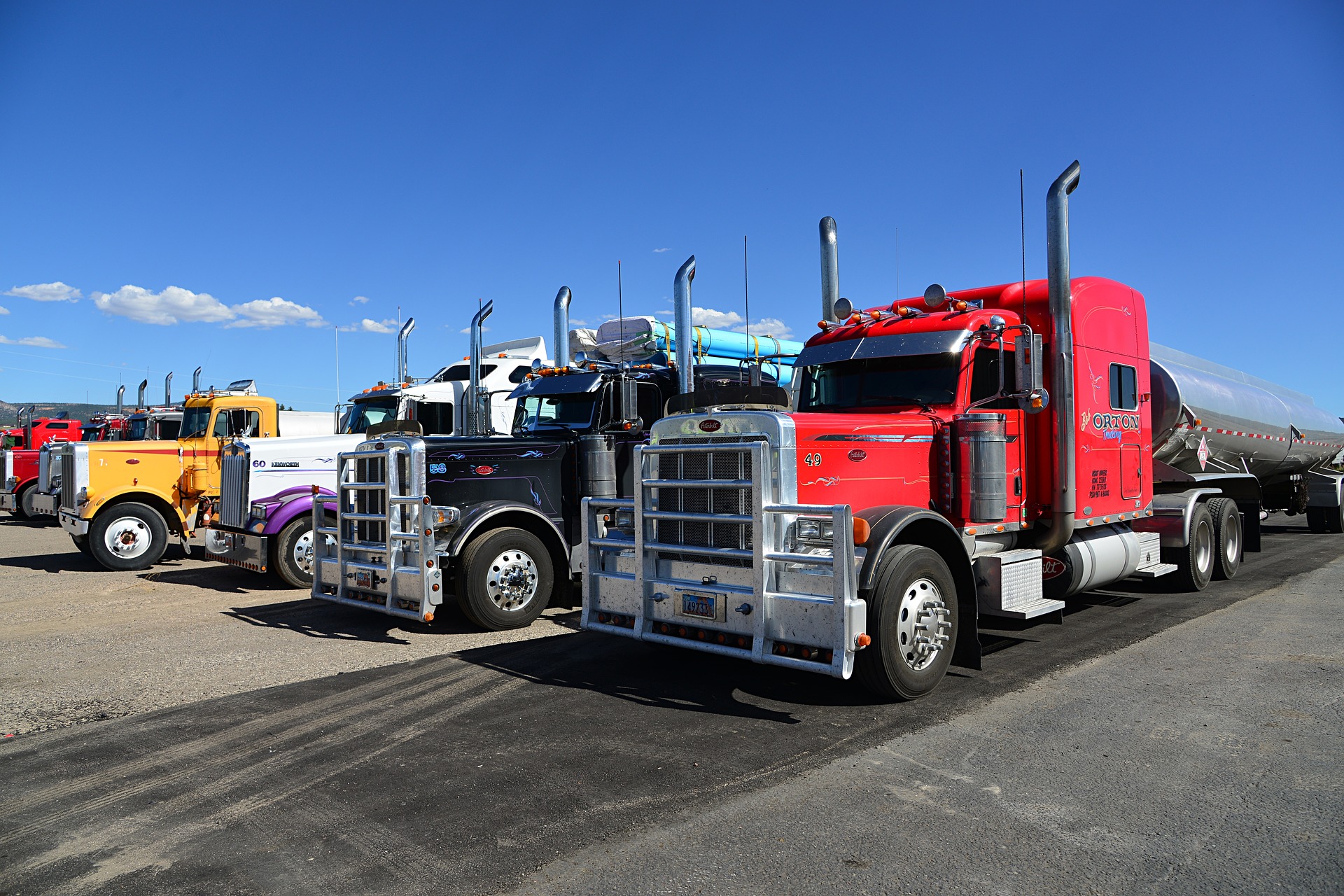 Oversized trucks parked in a lot