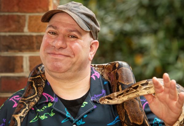 Mikey Romano with a snake