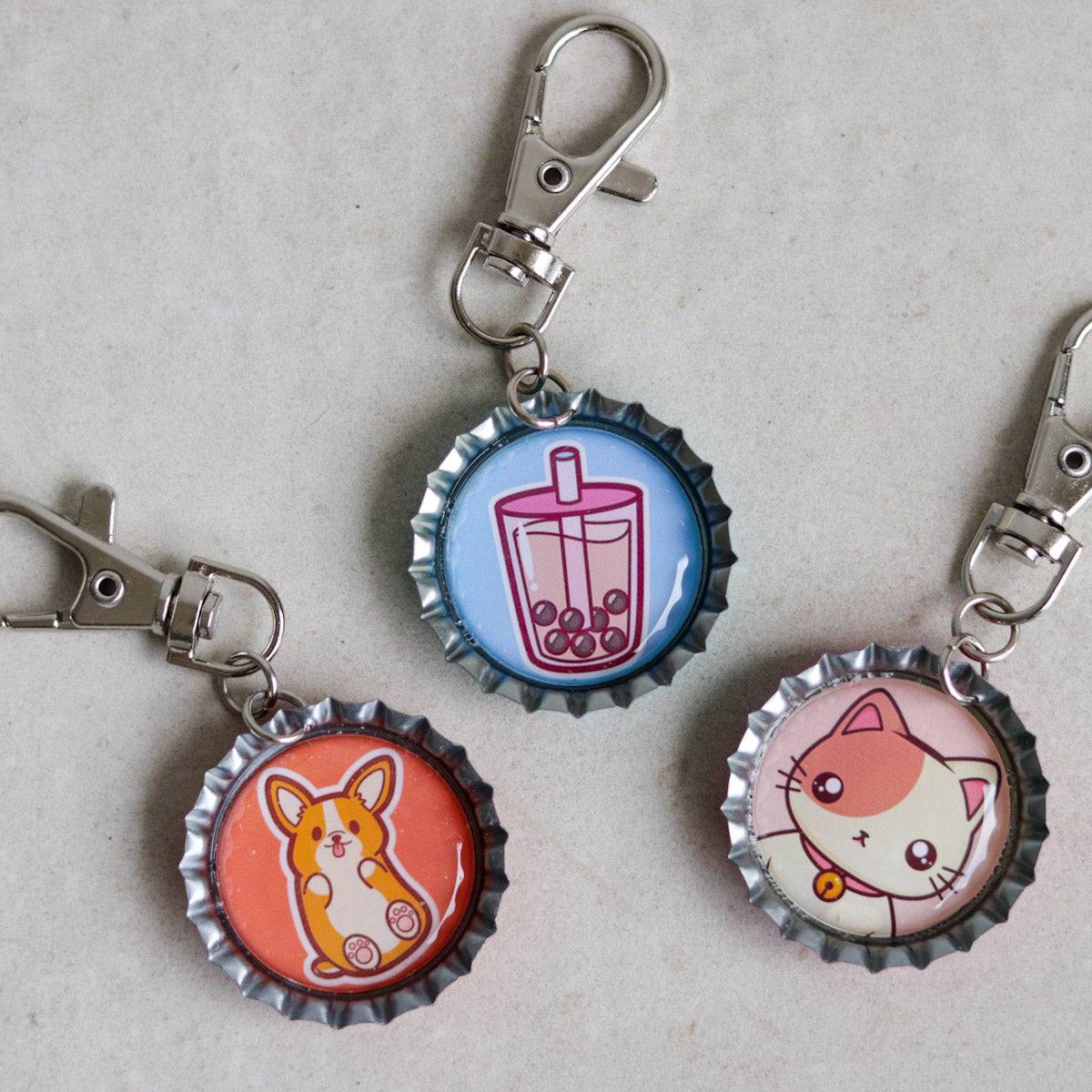 HB bottle-cap-keychains