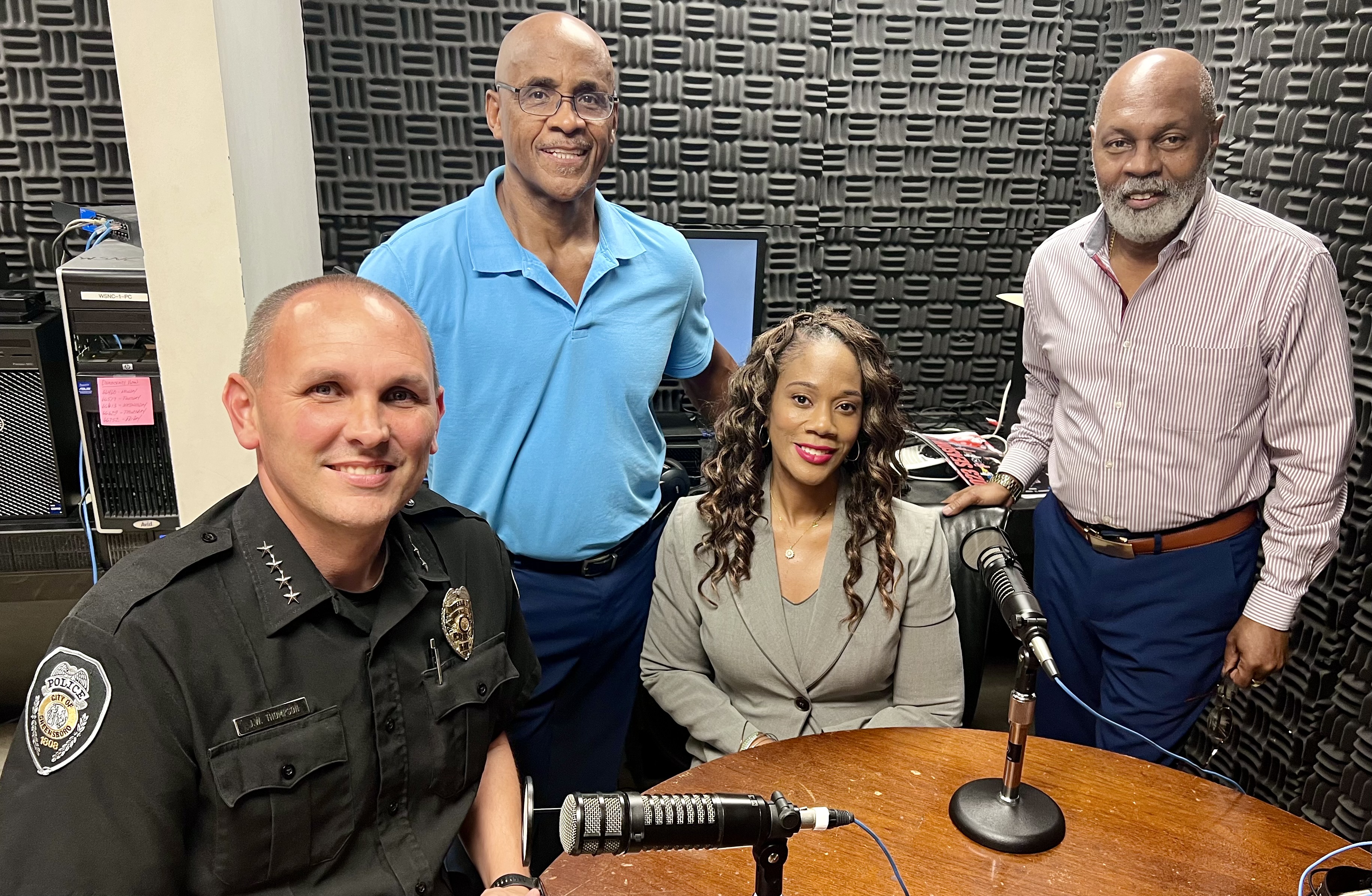 John Thompson and Latisha McNeil with WSNC staff